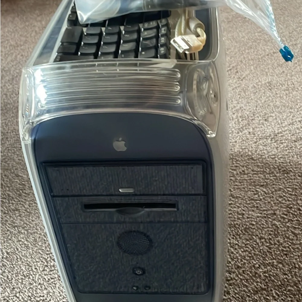 Apple Silver and Black Desktop with original Keyboard and mouse.